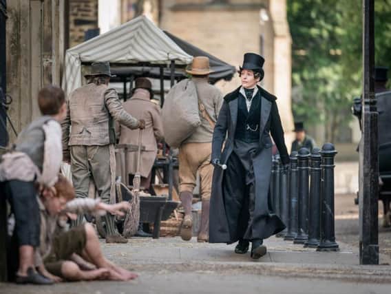 Suranne Jones during filming of a street scene in Gentleman Jack 
Credit: BBC/Lookout Point/Ben Blackall