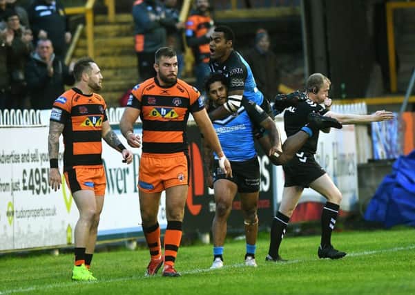 Hull's Albert Kelly is congratulated by fellow try scorer Ratu Naulago.  Picture Jonathan Gawthorpe