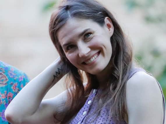 Amanda Knox attends a cocktail for the opening of the Innocence Project conference, in Modena, Italy