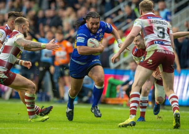 Konrad Hurrell charge's forward for Leeds Rhinos against Wigan. Picture: Bruce Rollinson