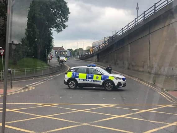A young woman was talked down from the York Road bridge by police.