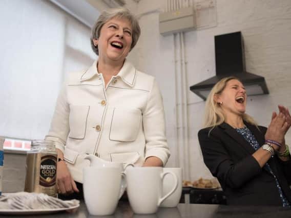 Prime Minister Theresa May with Jo Cox's sister Kim Leadbeater during a meeting at a social group in London run by a charity working to combat loneliness at the launch of the first loneliness strategy in October last year. . Launching the strategy, Mrs May confirmed English GPs will be able to refer lonely people to community and voluntary activities by 2023, as she paid tribute to murdered Labour MP Jo Cox, who had campaigned to end loneliness before her death.