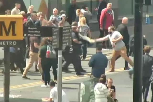The man throwing a milkshake on Nigel Farage. Photo: PA