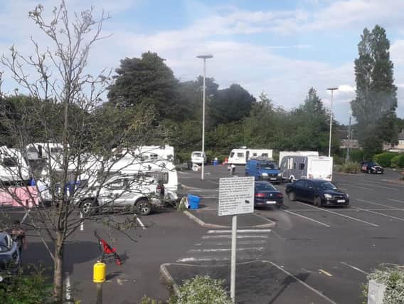 Travellers in the park and ride in King Lane.