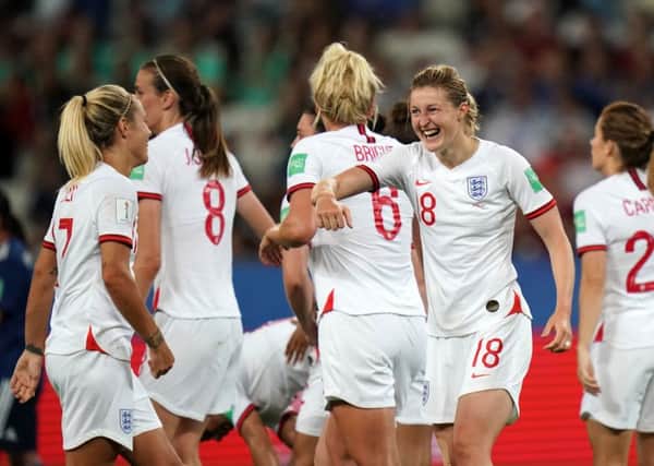 England's Ellen White celebrates scoring her sides second goal against Japan.