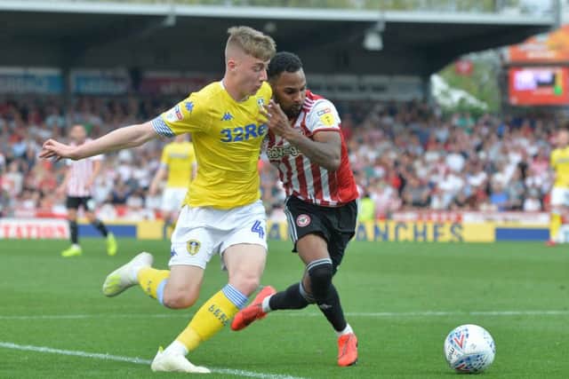 On his way?: Jack Clark is held off by Rico Henry. Picture: Bruce Rollinson