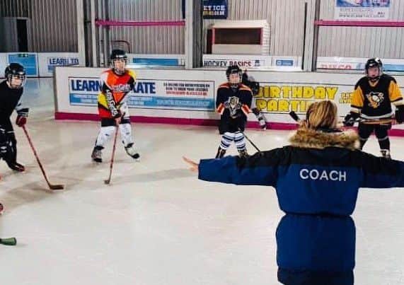 Youngsters can learn how to play ice hockey at the new Leeds ice rink on Elland Road.