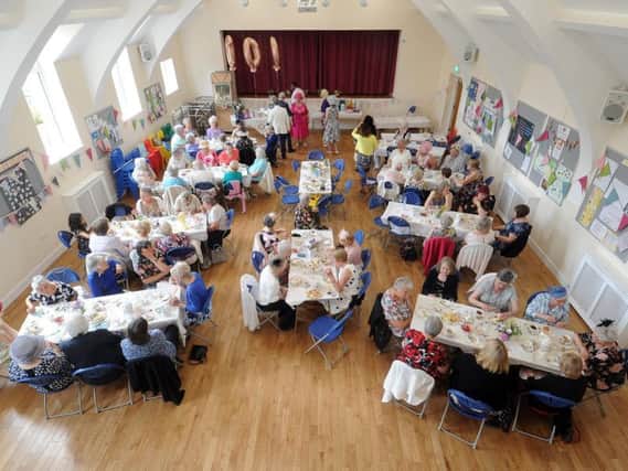 Meanwood Women's Institute members celebrate their 100th anniversary on 22 June 2019 with a vintage tea party at Holy Trinity Community Hall.  Picture Tony Johnson.