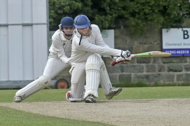Sam Atkinson, of Collingham & Linton, attempts a sweep shot on the way to 23. PIC: Steve Riding
