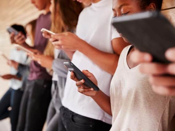 School children as young as 11 could be taught about the dangers of sexting after new teaching guidelines were released by the government (Photo: Shutterstock)
