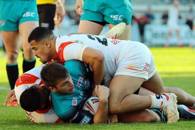 Tom Briscoe finds it tough going in Perpignan against Catalans earlier this season.
