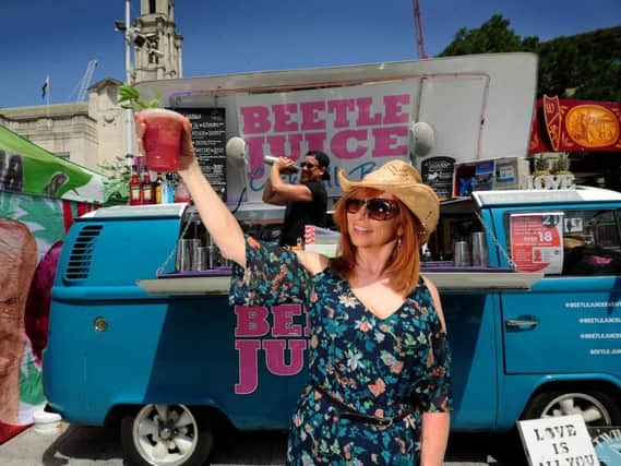 Claire Macklam and Dan Gore, of the Beetle Juice cocktail van, serving up drinks at the Leeds Food & Drink Festival