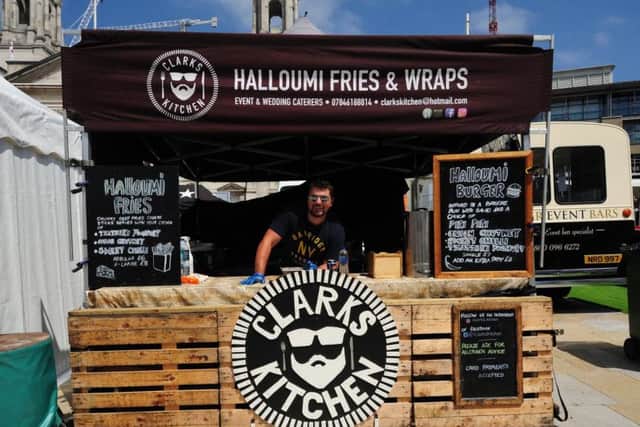 Clark Davies, owner of Clark's Kitchen, selling halloumi fries and burgers at the festival.