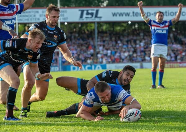 Hat-trick hero, Tyler Randell, scores Trinity's opening try against Huddersfield. PIC: Bruce Rollinson/JPIMedia