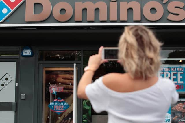 The Domino's logo at the Headingley store has been painted bronze in honour of England Lioness Lucy Bronze.