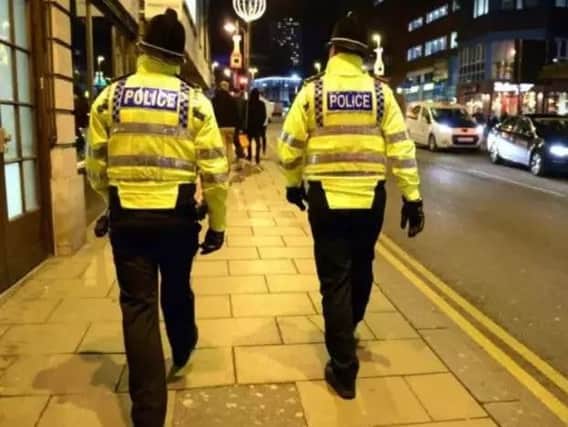 A man has been charged after defecating in a shop doorway in town centre.