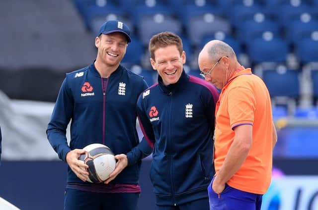 England's Jos Buttler (left) and Eoin Morgan (centre) with ground staff during the nets session at Riverside Durham. Picture: Owen Humphreys/PA
