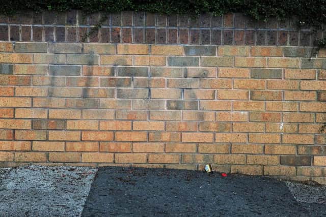 Flock graffiti on wall on Reginald Street, Chapeltown.
