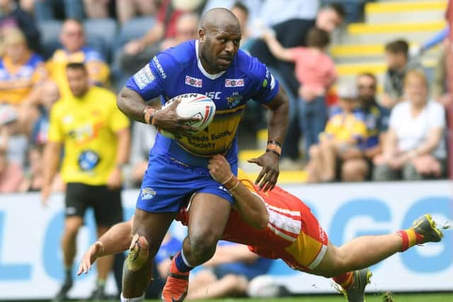 Robert Lui is tackled by Catalans Dragons' Benjamin Jullien.