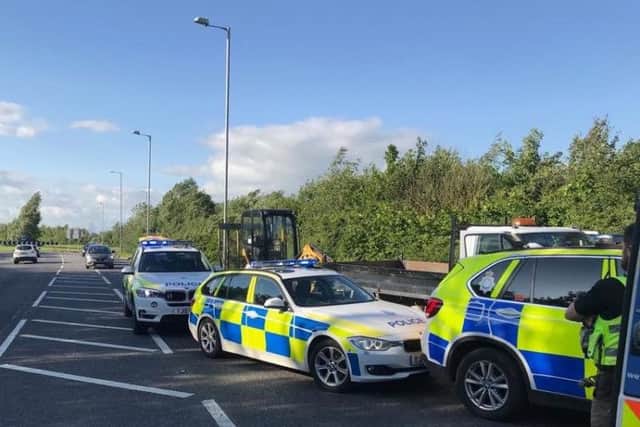 Police box in the stolen digger on the A19 near Selby