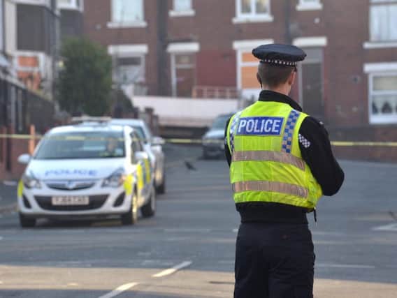 File photo from SWNS of a police scene in Harehills.