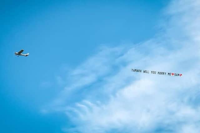 Sam Winter proposed to his partner Tamara with a plane that was spotted flying over Leeds. Picture: Rob Keeble