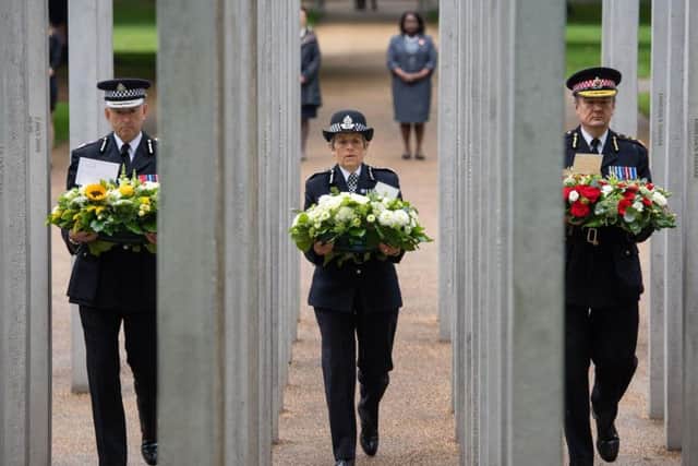 Chief Constable of British Transport Police Paul Crowther, Metropolitan Police Commissioner Cressida Dick and City of London Police Commissioner Ian Dyson, lay wreaths at the 7/7 Memorial, in Hyde Park, London, to mark the anniversary of the terrorist attacks on London on July 7 2005 that killed 52 people.