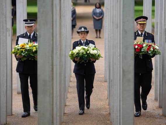 Chief Constable of British Transport Police Paul Crowther, Metropolitan Police Commissioner Cressida Dick and City of London Police Commissioner Ian Dyson, lay wreaths at the 7/7 Memorial, in Hyde Park, London, to mark the anniversary of the terrorist attacks on London on July 7 2005 that killed 52 people.