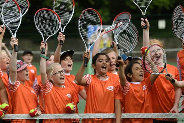 Over 70 children from Moortown Primary School and Holy Family Primary Schools take part in Tennis for Kids.