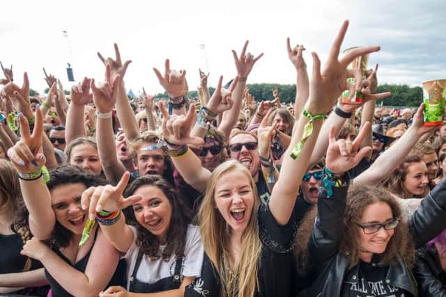 Festival goers enjoy the Leeds Festival at Bramham Park in 2016 (Danny Lawson / PA Wire).