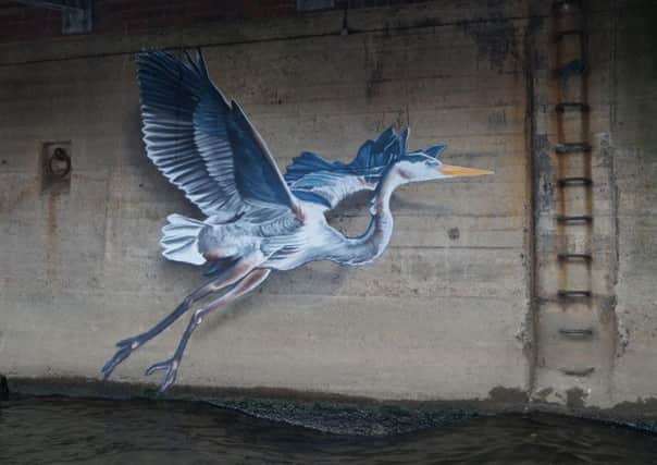 The Grey Heron is designed to be submerged and then reappear as the river level changes.