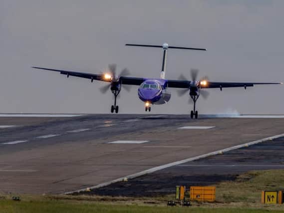 A Flybe aircraft landing at Leeds Bradford Airport (pic: Charlotte Graham)