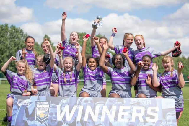 Corpus Christi year eight girls celebrate their victory over Sirius Academy.