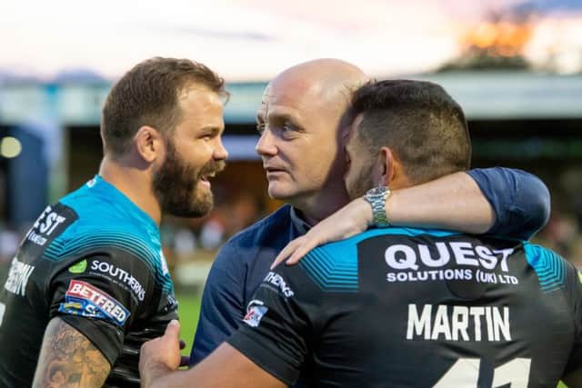 Richard Agar with Adam Cuthbertson and Rhyse Martin after the victory over Castleford.