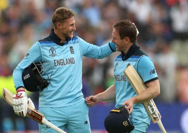 England's Joe Root (left) and Eoin Morgan celebrate victory against Australia at Edgbaston. Picture: Nigel French/PA