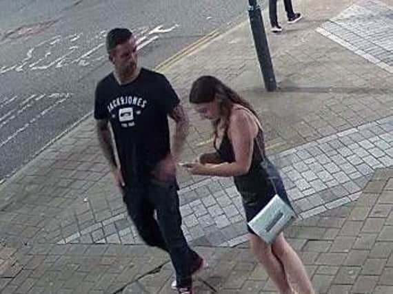 Police have released this CCTV image of a man and woman they want to speak to about an assault on Briggate, Photo: West Yorkshire Police.