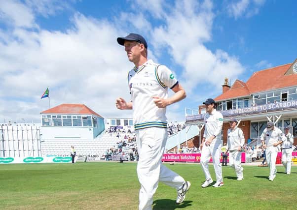 Yorkshire's Steve Patterson leads his side out against Surrey at Scarborough's North Marine Road earlier this month. Picture: Allan McKenzie/SWpix.com