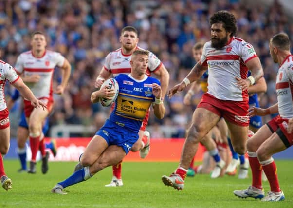 SURROUNDED: Leeds Rhinos' Jack Walker tries to find a way through Hull KR at Headingley. 
Picture: Bruce Rollinson