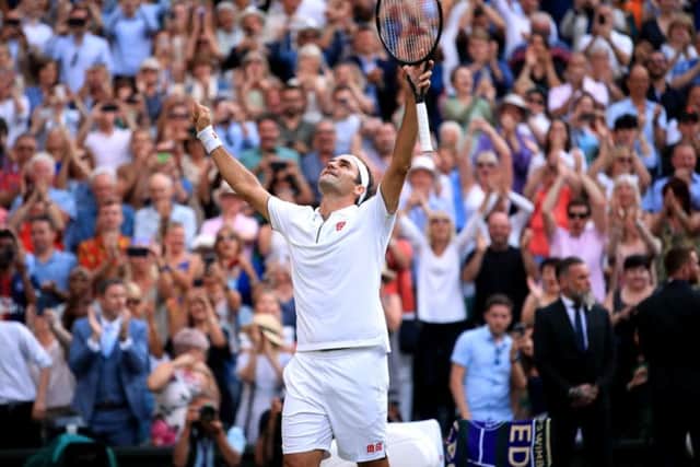 Roger Federer celebrates victory in his Wimbledon semi-final against Rafael Nadal. Picture: Adam Davy/PA