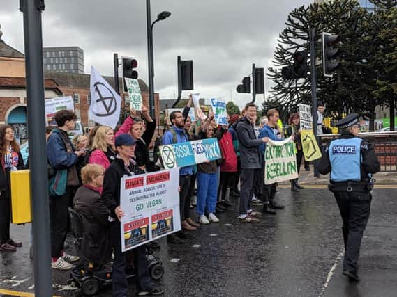 Extinction Rebellion protesters block traffic on the A61 in Leeds