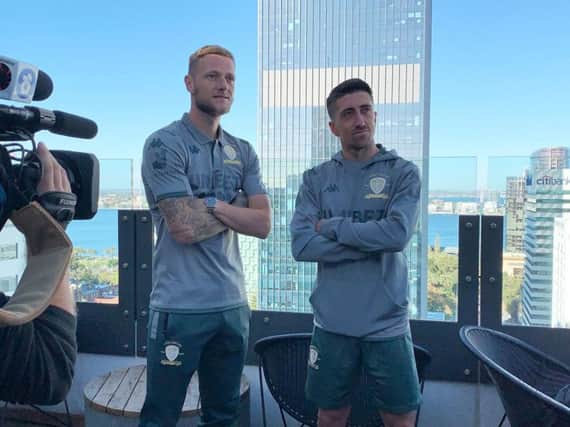 Leeds United's Liam Cooper and Pablo Hernandez in Perth.
