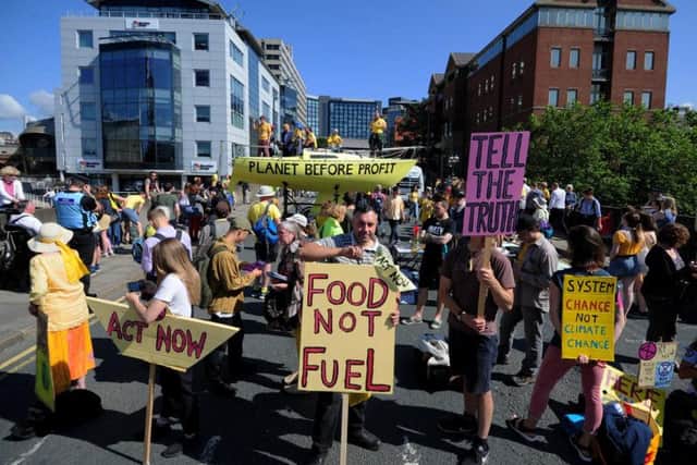 Extinction Rebellion protesters blocking Victoria Bridge in Leeds City Centre.