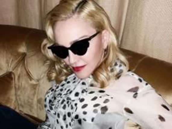 Pop star Madonna pictured wearing Burberry