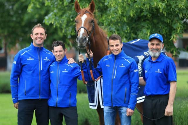 Trainer Charlie Appleby, left, with his winning Masar team. PIC: Simon Cooper/PA Wire