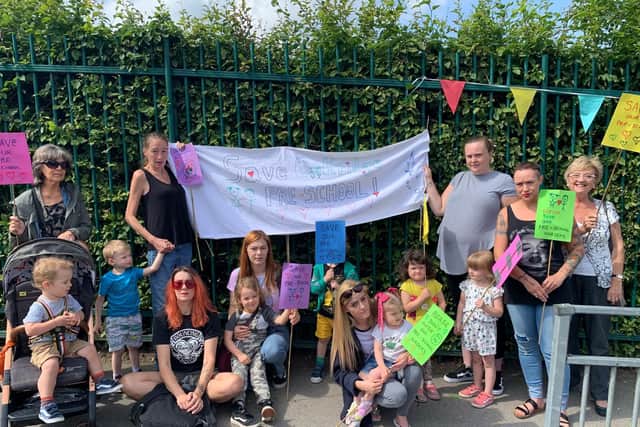 Parents and children outside Cookridge Pre School after they were told the nursery was being evicted from the premises last week