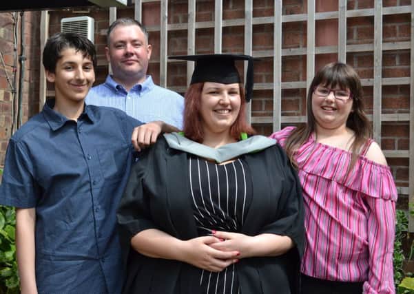 Delight: Kimberley Jones with Jack, Mark and Alexa after graduating at the University of Cumbria.