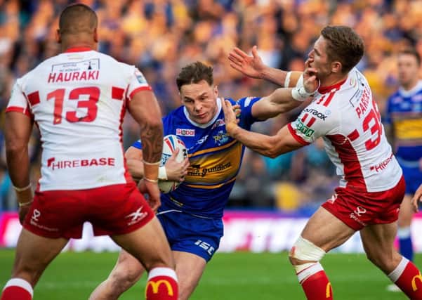 James Donaldson palms off Matt Parcell during last week's clash with Hull KR.
