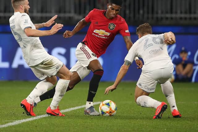 HANDFUL: Manchester United's England international Marcus Rashford prepares to skin Leeds United's Gaetano Berardi before doubling the Red Devils lead. Picture by Paul Kane/Getty Images.