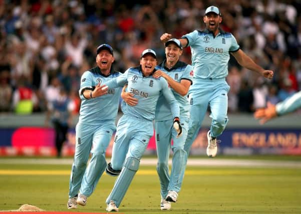INSPIRATION: England's players, including Yorkshire's Jonny Bairstow, left, begin their celebrations after clinching the World Cup at Lord's on Sunday. Picture: Nick Potts/PA