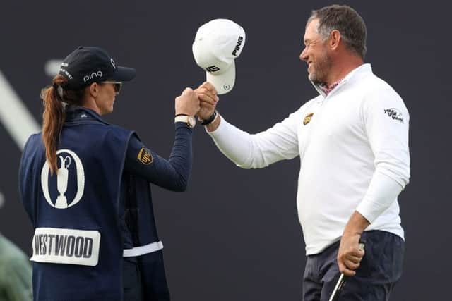 England's Lee Westwood celebrates with his girlfriend and caddie Helen Storey after his birdie on the 18th at Royal Portrush. Picture: David Davies/PA/TheOpen.com